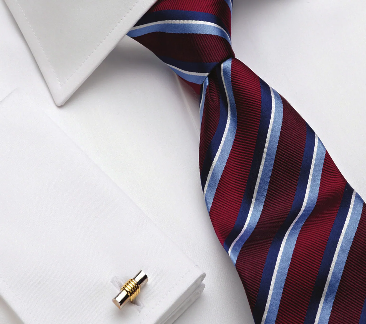 White tailored shirt with a burgundy, navy and powder-blue striped tie